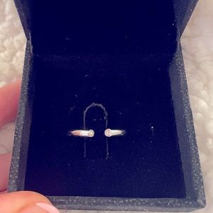 Stainless steel minimalist band with hidden cz stones.